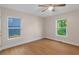 Bright bedroom with two windows and hardwood floors at 1346 Wichita Sw Dr, Atlanta, GA 30311