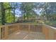 Newly renovated outdoor deck with railings overlooking landscaped backyard at 1346 Wichita Sw Dr, Atlanta, GA 30311