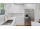 Beautiful kitchen featuring stainless steel appliances, granite countertops, and white cabinetry at 1346 Wichita Sw Dr, Atlanta, GA 30311