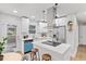 Modern kitchen featuring stainless steel appliances, white cabinets, and an island at 1346 Wichita Sw Dr, Atlanta, GA 30311
