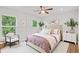 Comfortable main bedroom with natural light, neutral tones, and hardwood floors at 1346 Wichita Sw Dr, Atlanta, GA 30311
