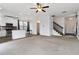 Bright living room space with fireplace, stairs, and kitchen area at 5885 San Gabriel Ln, Atlanta, GA 30349
