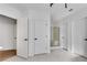 This bathroom has multiple closets and a glass shower with gold trim at 4065 Tritt Homestead Dr, Marietta, GA 30062