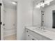 White bathroom with bright lights and a vanity at 4065 Tritt Homestead Dr, Marietta, GA 30062
