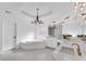 Bright bathroom featuring a large tub, dual sinks, and modern finishes at 4065 Tritt Homestead Dr, Marietta, GA 30062