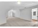 Upstairs bedroom with carpeted floors that leads into the bathroom at 4065 Tritt Homestead Dr, Marietta, GA 30062