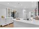 Bright kitchen featuring stainless steel appliances, a large island, and custom white cabinetry at 4065 Tritt Homestead Dr, Marietta, GA 30062