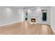 Living room featuring wood floors, a fireplace, and plenty of natural light at 4065 Tritt Homestead Dr, Marietta, GA 30062