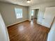 Bedroom showcasing hardwood floors, closet, and a window, enhancing the room's appeal at 774 Mill Rd, Mcdonough, GA 30253