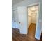 View of closet showing wire shelving for plenty of storage and wood-look floors at 774 Mill Rd, Mcdonough, GA 30253