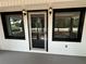 Charming front porch and door with decorative glass windows at 774 Mill Rd, Mcdonough, GA 30253