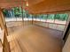 Enclosed porch offers great view of backyard and surrounding woods at 774 Mill Rd, Mcdonough, GA 30253