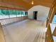 Large enclosed porch provides bug free outdoor space at 774 Mill Rd, Mcdonough, GA 30253