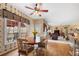 Bright breakfast nook with wood table, ceiling fan and views of the deck and outside scenery at 1810 Valley Brook Dr, Alpharetta, GA 30005