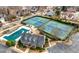 Overhead shot displays the community pool, tennis courts, clubhouse, and surrounding neighborhood homes at 1810 Valley Brook Dr, Alpharetta, GA 30005