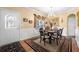 Dining room features a decorative entry door, chandelier, and classic design elements at 1810 Valley Brook Dr, Alpharetta, GA 30005