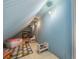 Attic area with play and storage space, showcasing the potential for creative use at 204 Overland Trl, Mcdonough, GA 30252
