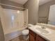 Bathroom featuring a bathtub with shower and a single vanity at 2752 Live Oak Trl, Atlanta, GA 30349