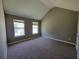 Bedroom featuring two windows and carpeted floors at 2752 Live Oak Trl, Atlanta, GA 30349