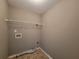 Compact laundry room features neutral walls at 2752 Live Oak Trl, Atlanta, GA 30349