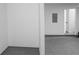 Unfinished basement featuring painted concrete floors and white walls at 3094 Jonesboro St, Ellenwood, GA 30294