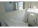 Inviting entryway featuring a front door with glass accents and a staircase at 3094 Jonesboro St, Ellenwood, GA 30294