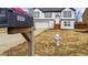 Charming two-story home with a well-kept lawn, updated paint, and a convenient mailbox and fire hydrant at 3094 Jonesboro St, Ellenwood, GA 30294