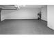 Spacious garage with epoxy flooring and ample space for storage at 3094 Jonesboro St, Ellenwood, GA 30294