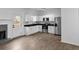 Modern kitchen featuring stainless steel appliances, sleek black countertops, and ample white cabinetry at 3094 Jonesboro St, Ellenwood, GA 30294