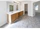 Main bathroom featuring a double vanity and tile floor at 6028 Arbor Links Rd, Lithonia, GA 30058
