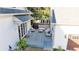 Aerial view of backyard deck with ample seating, including grill, and white siding at 216 Haralson Ne Ln, Atlanta, GA 30307