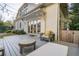 Outdoor patio featuring plenty of seating with a view of the back yard at 216 Haralson Ne Ln, Atlanta, GA 30307