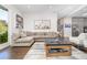 Comfortable living room with ample seating, a large window, and views of the outdoors at 216 Haralson Ne Ln, Atlanta, GA 30307
