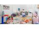 Spacious playroom with colorful decor, various toys, and ample storage at 216 Haralson Ne Ln, Atlanta, GA 30307