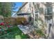 This outdoor space offers a fenced in yard and a patio with a table and chairs and outdoor rug at 38 Trailview Ln, Hiram, GA 30141