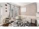 Cozy dining area with a glass table, modern chairs, and stylish decor at 38 Trailview Ln, Hiram, GA 30141