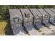 Charming townhome showcasing neutral colors, attached garages, and a landscaped front yard at 38 Trailview Ln, Hiram, GA 30141