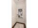 Bright foyer with a front door featuring a window with blinds and clean white molding at 38 Trailview Ln, Hiram, GA 30141