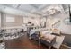 Open-concept living area featuring a kitchen, dining space, and living room under a coffered ceiling at 38 Trailview Ln, Hiram, GA 30141