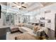 Bright living space seamlessly blends the kitchen, dining, and living areas under an elegant coffered ceiling at 38 Trailview Ln, Hiram, GA 30141