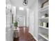 Bright foyer featuring hardwood floors, high ceilings, and an inviting view into the home at 384 Wesley Dr, Acworth, GA 30101