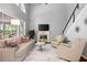 Inviting living room with cozy fireplace, comfortable seating, and bright natural light at 384 Wesley Dr, Acworth, GA 30101