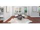 Cozy reading nook with chairs and unique cowhide rug with access to the outdoors at 384 Wesley Dr, Acworth, GA 30101