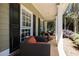Inviting front porch featuring outdoor seating, perfect for enjoying the serene surroundings at 384 Wesley Dr, Acworth, GA 30101