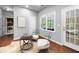 Bright sitting room area features natural lighting with views of the outdoors at 384 Wesley Dr, Acworth, GA 30101