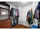 Spacious walk-in closet with custom shelves and hanging racks, providing ample storage space at 384 Wesley Dr, Acworth, GA 30101