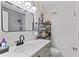 Bathroom with stylish vanity, mirror, and storage shelves, adding a modern touch at 5566 River Heights Se Xing, Marietta, GA 30067