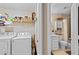 Laundry room next to bathroom at 5566 River Heights Se Xing, Marietta, GA 30067