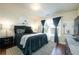 Comfortable bedroom with stylish decor and natural light at 6150 Thorncrest Dr, Tucker, GA 30084