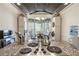 Sun-drenched dining area with bay windows and stylish decor, perfect for Gathering meals at 6150 Thorncrest Dr, Tucker, GA 30084